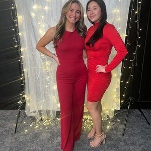 Red Jumpsuit with thick criss cross back.